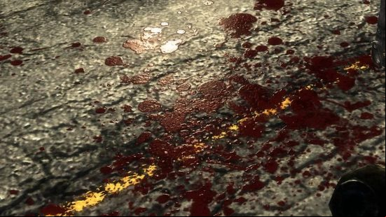 A splatter of blood lies on the ground, image taken with Enhanced Blood Texture installed, one of the best Fallout 3 mods.