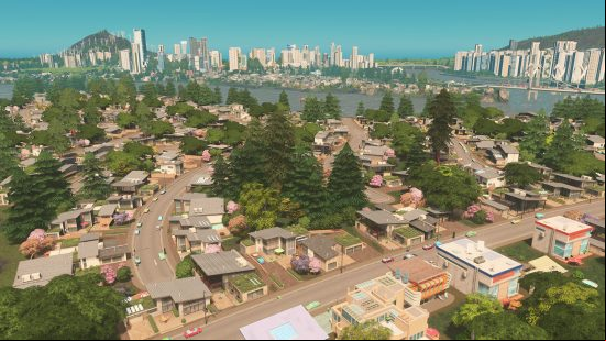 Best single player games - Cities Skylines: A huge city, with skyscrapers and a massive bridge in the distance, and a homely suburb in the foreground with lots of pine trees.