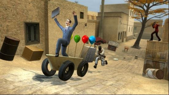Sandbox games - Garry's Mod: A man in a suit travels up the road on a bath on wheels while another man pursues him