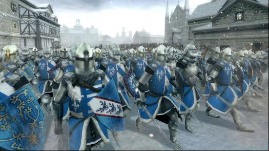Best Medieval games - soldiers marching through a snow-covered town in Total War: Medieval 2.