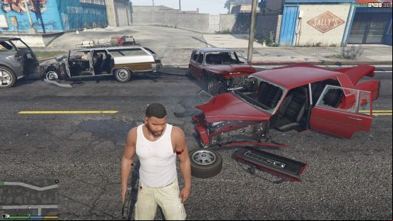Best GTA 5 mods - Franklin is standing next to a destroyed red car.