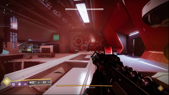 Destiny 2 Beyond Light raid: first person view of a futuristic white room covered in clean red patterns.