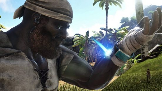 Best Ark Survival mods: Using an electronic device on the wrist with the Dino Tracker mod in Ark Survival Evolved.
