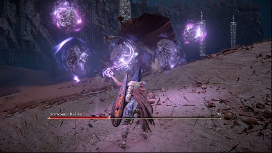 Elden Ring Radahn - a mage using the Rock Sling spell to hit Radahn.