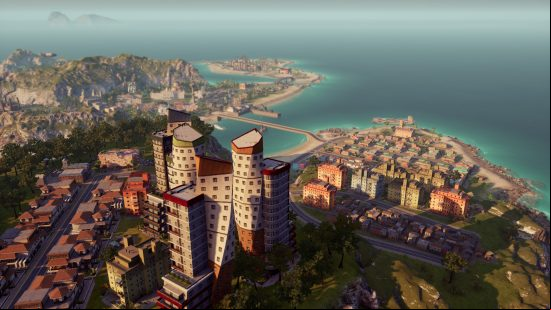 Best tycoon games: An overview of a residential area, with a small suburb dwarfed by a large apartment block in Tropico 6.