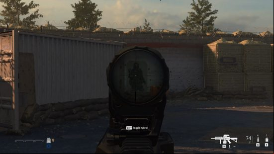 Modern Warfare Ghost Team targets: a soldier aims a good at a stationary wooden silhouette.
