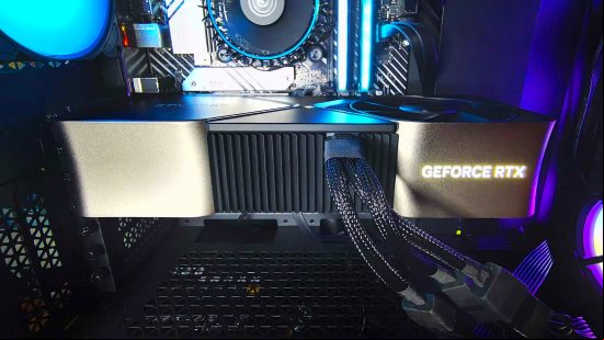 Nvidia RTX 4080 installed in PC case next to RGB RAM