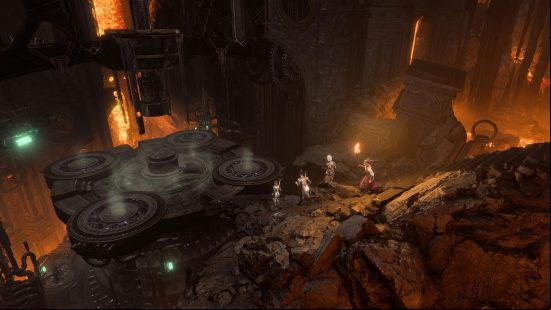 Four adventurers run toward a distant platform in a dark cavern in Baldur's Gate 3.