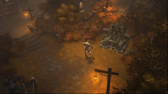 A buff man stands in front of an old altar amid dying trees bathed in orange light