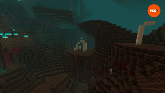 Soul sand curves around fossils as skeletons stand around under a green sky in the soul sand valley, one of the Minecraft biomes in the Nether.