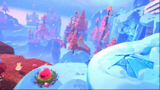 Slime Rancher Song of the Sabers update: The Powderfall Bluffs biome from above, with orange trees among the white snow