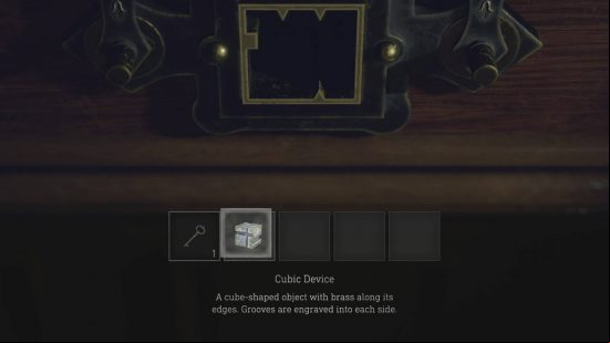 Resident Evil 4 Remake assault rifle location - the puzzle box and the Cubic Device needed to unlock the assault rifle.