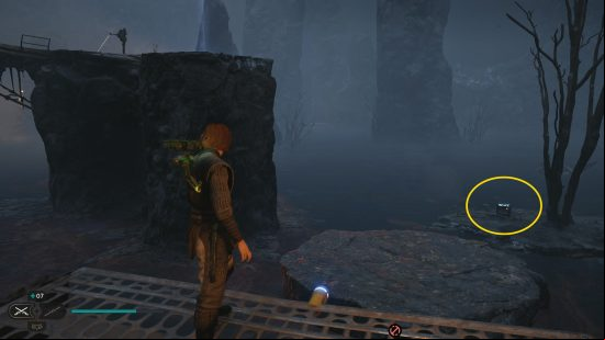 A man searches a dark and foggy forest for the next Cal Kestis cosmetics