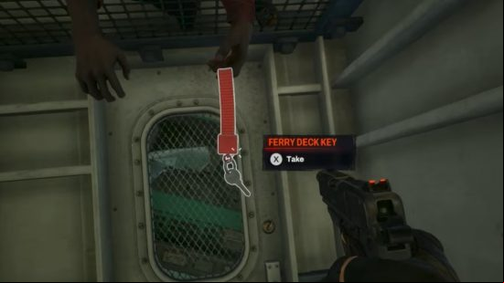 A person with a hangun grabs at a key hanging from a dead body.