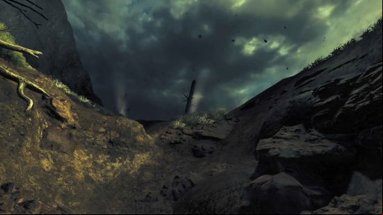 A view of a WWI warzone with smoke rising in the distance