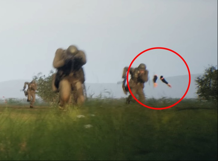 Hell Let Loose trailer glitches: A pair of floating arms hover above the battlefield in FPS game Hell Let Loose