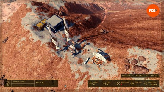 An overview of a Starfield outpost with a power source, extractor, beacon, and supply container in a desert landscape.