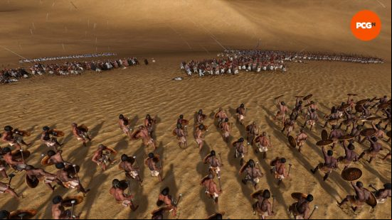 An army of troops waiting for archers to attack another army before approaching in a desert area