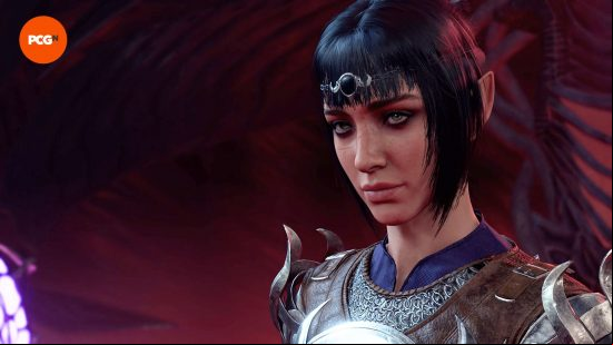 BG3 romance: a black-haired woman with shiny silver armor.