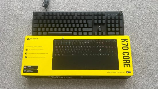 An image of the Corsaire K70 Core next to it's box