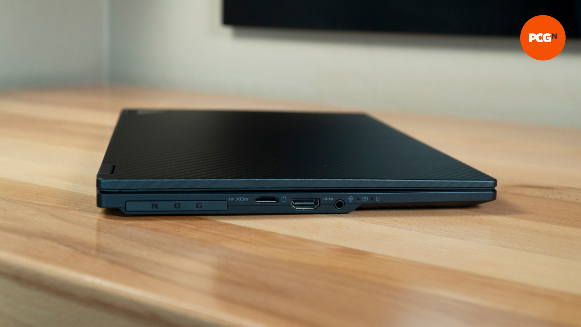 Side view of the Asus Rog X13 laptop with the lid shut