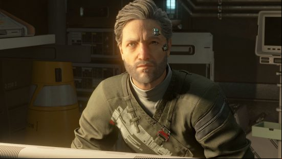Best open-world games: A character from Starfield sits with metal chips on his forehead and in grey and red robes.