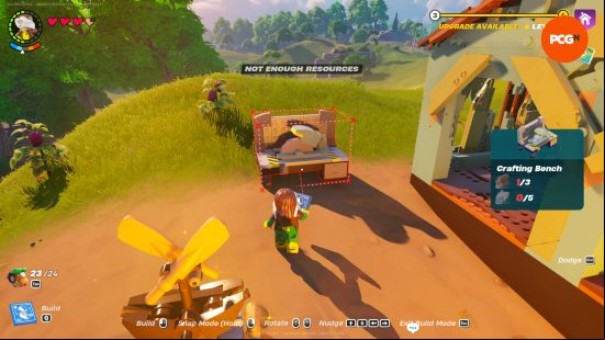 Lego Rogue is about to craft a crafting table outside her village to make Lego Fortnite weapons.