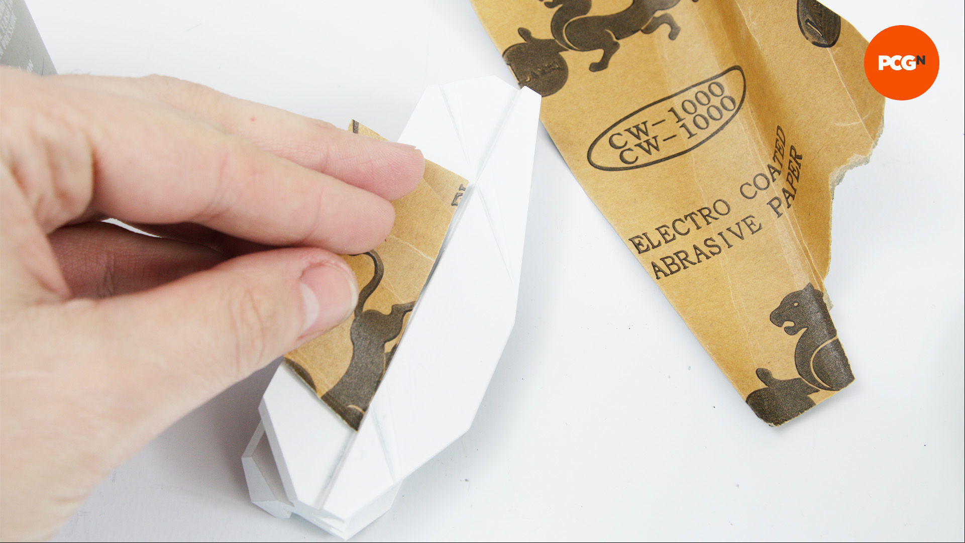 Wet and dry sandpaper used to rub down the heatsinks so that paint can adhere properly