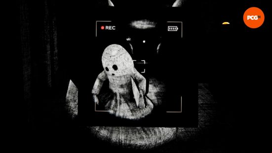 The player holds their camera up to film Knifo, one of the Content Warning monsters, rapidly approaching, a knife in hand.