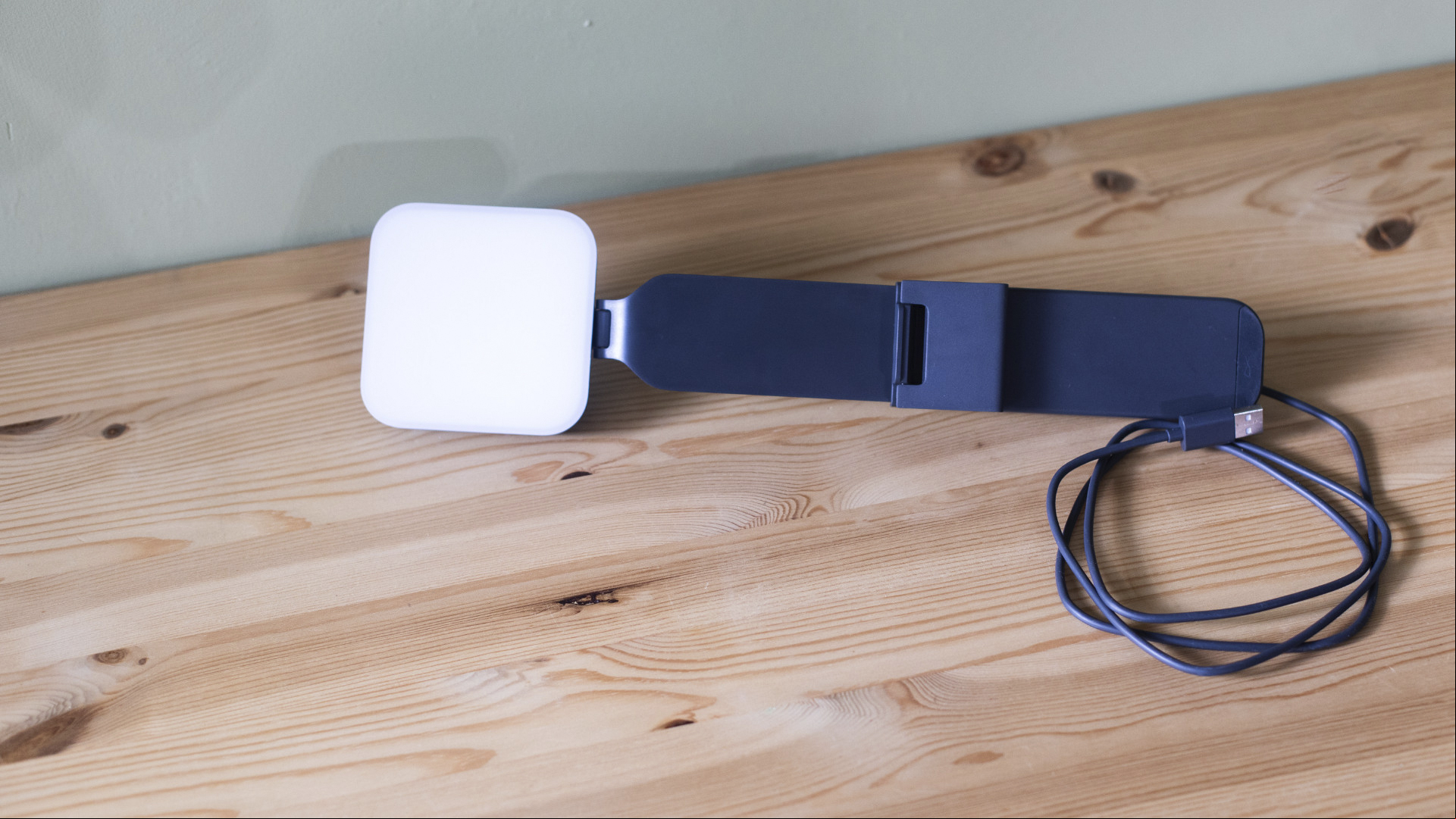 The Logitech Litra Glow light on a wooden table