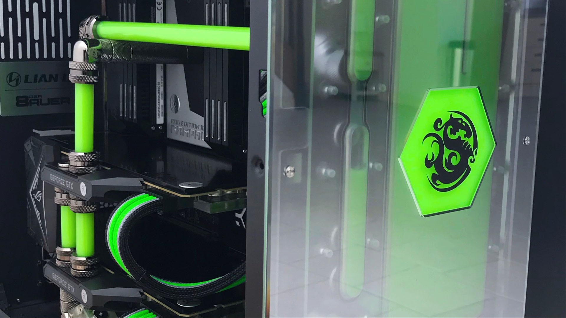 The bright green logo on the front of the acid rain gaming pc
