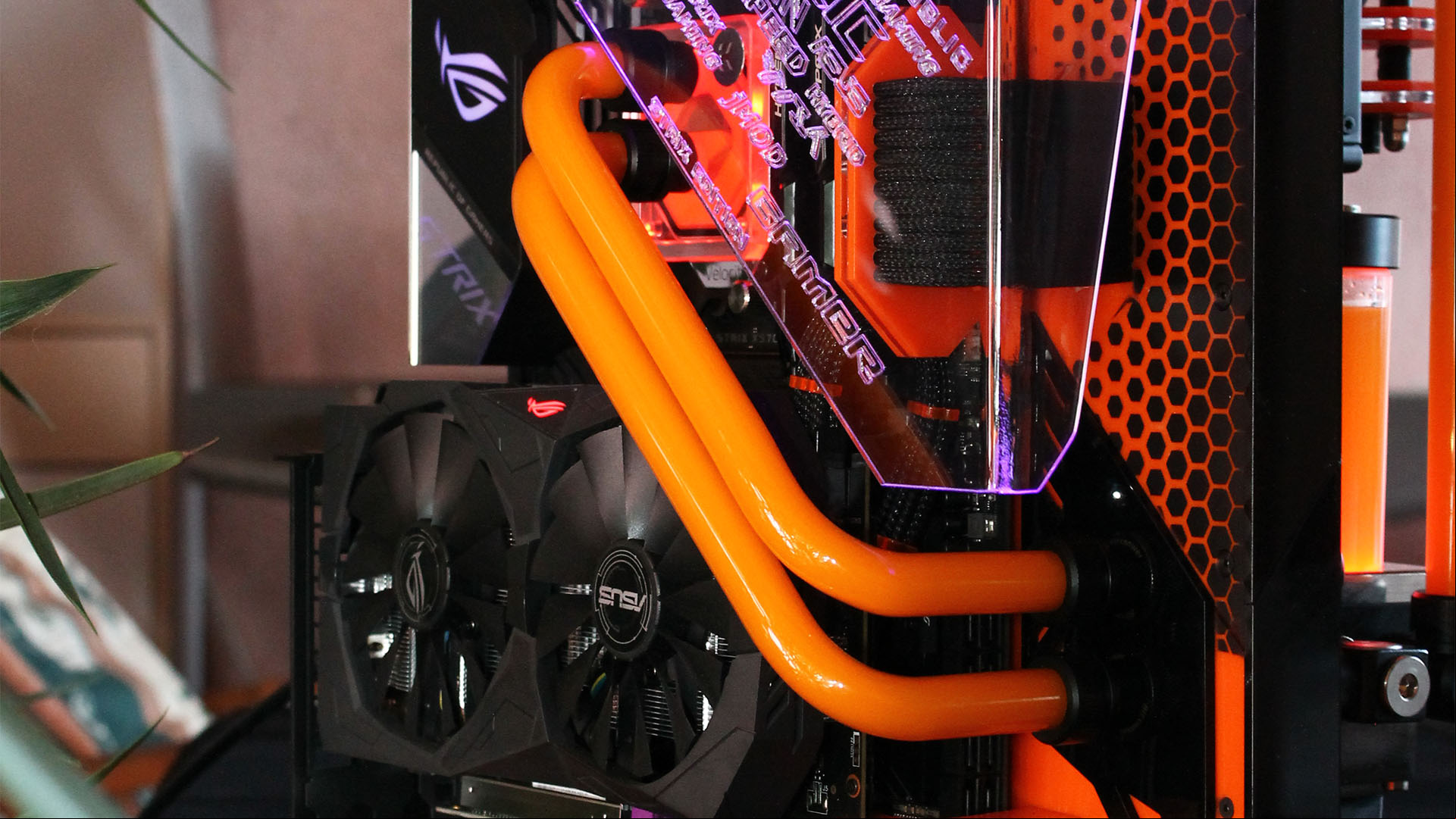 The watercooling tubs running across the open air gaming PC