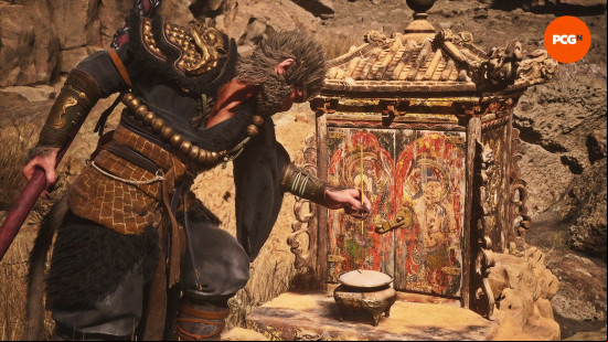 Black Myth Wukong review: The Destined One places a strand of hair into an incense burner at a Keeper's shrine.