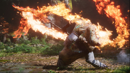 Black Myth Wukong best weapons: a character flails a flaming staff