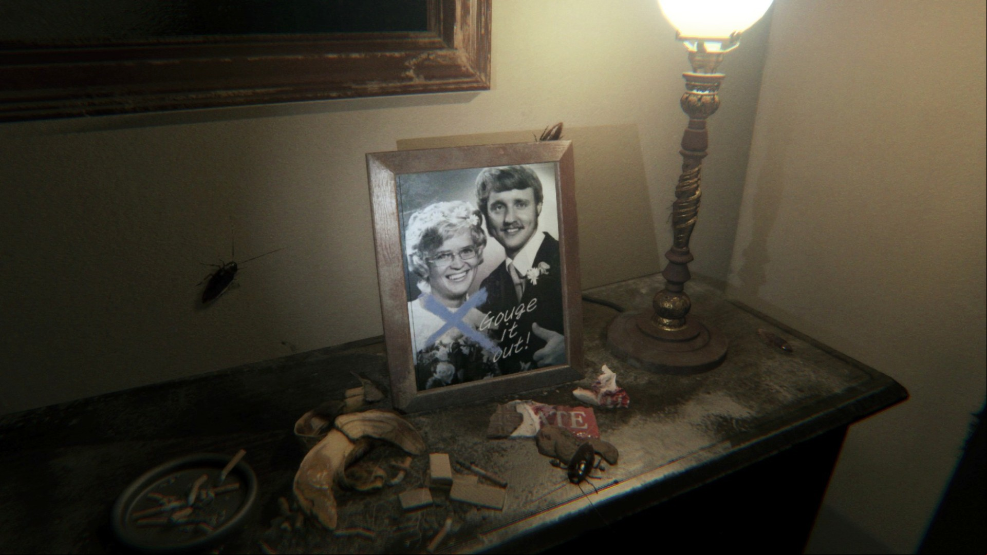 Picture from PT of a husband and wife with the words "gouge it out" written over it.
