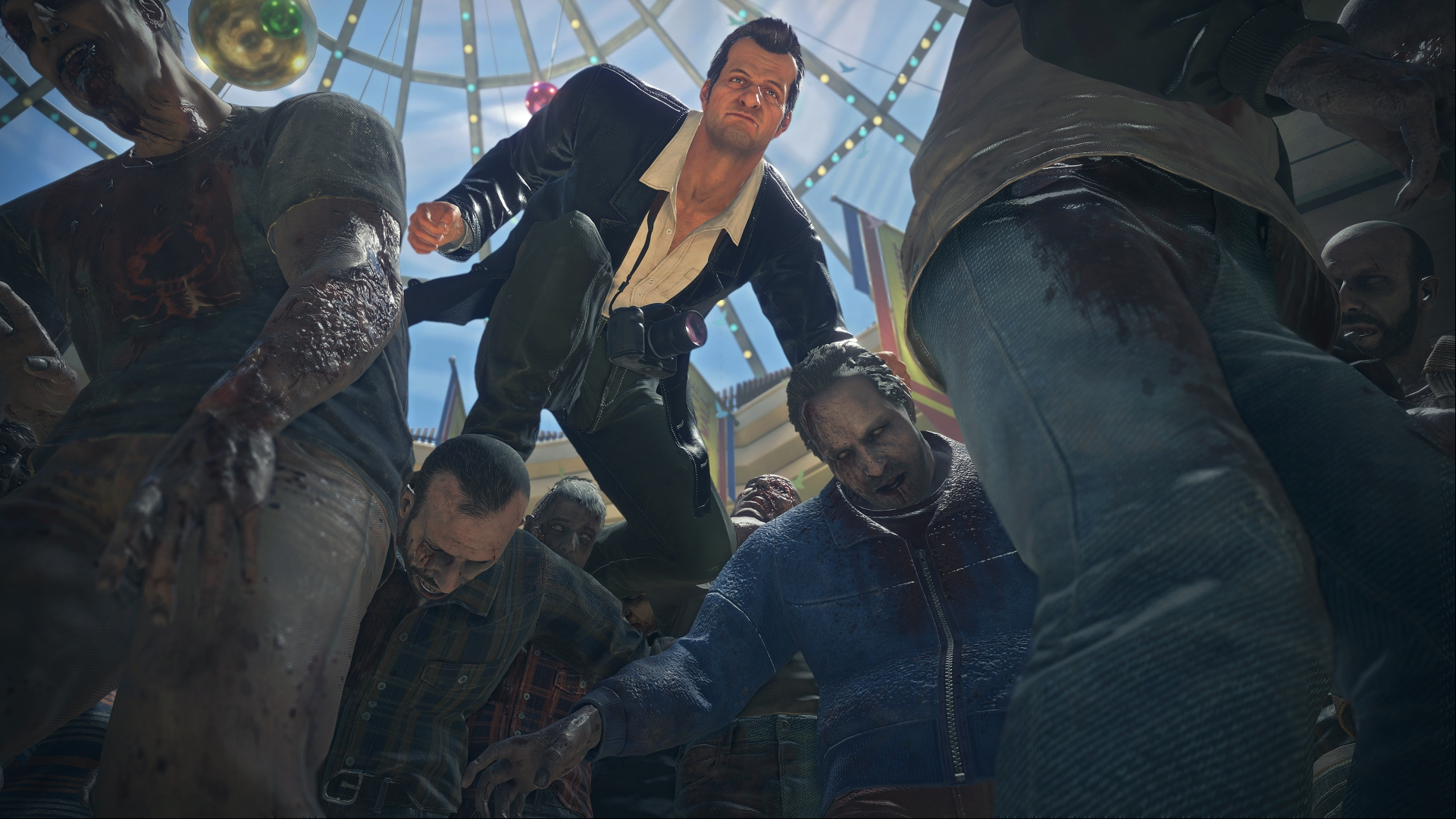 Dead Rising Remaster review: A man, Frank West, climbing over zombies in Capcom open-world game Dead Rising