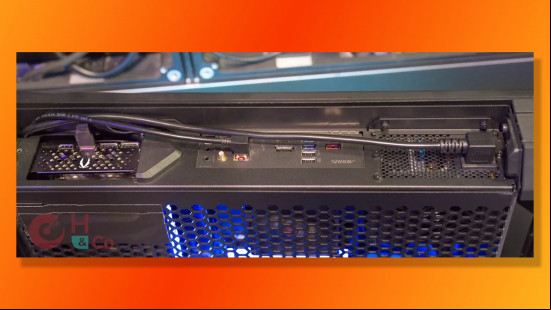 Erazer gaming PC built into a monitor, top of machine showing cable routing