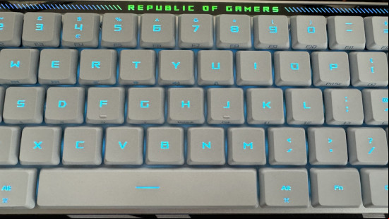 ASUS ROG Falchion RX Low Profile with all keycaps lit up in an icy blue