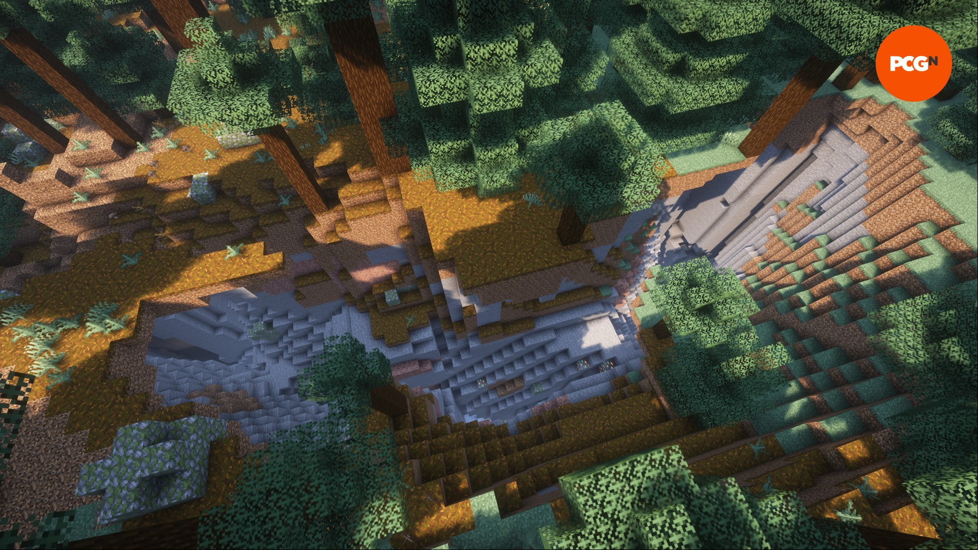 A top-down view of a ground fissure in one of the best Minecraft seeds, that leads down to an open lush cave.