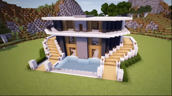 A modern Minecraft mansion house with twin staircases wrapping around the exterior.