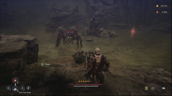 The First Berserker Khazan review: Khazan fighting a giant spider in a cave