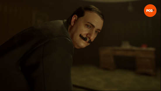 Karma the Dark World review: A man in a suit with a mustache turning toward the camera, Fred Ebert from Karma The Dark World.