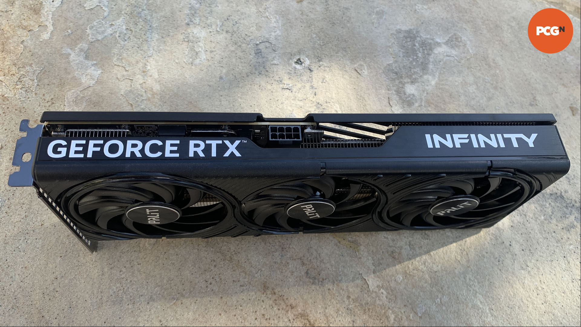 Nvidia GeForce RTX 5060 Ti review: 16GB Palit graphics card top edge showing 8-pin power connector.