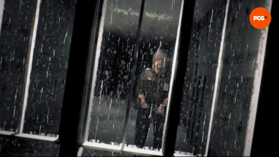 Best horror games: Roman, the Post Trauma protagonist, looks through a rain-soaked window.