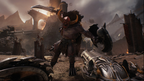 First-person view of a demon leaping towards Doom Slayer as he prepares to fire his super shotgun.