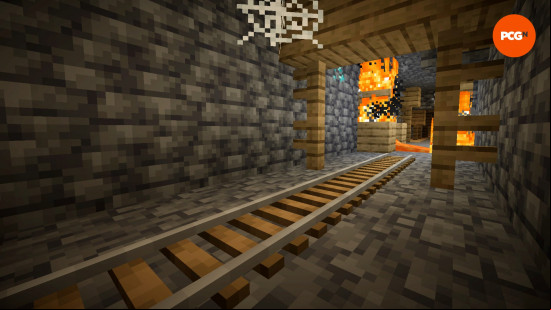 A 3D rail runs through a mineshaft with Ray's 3D rails installed, one of the best Minecraft texture packs.