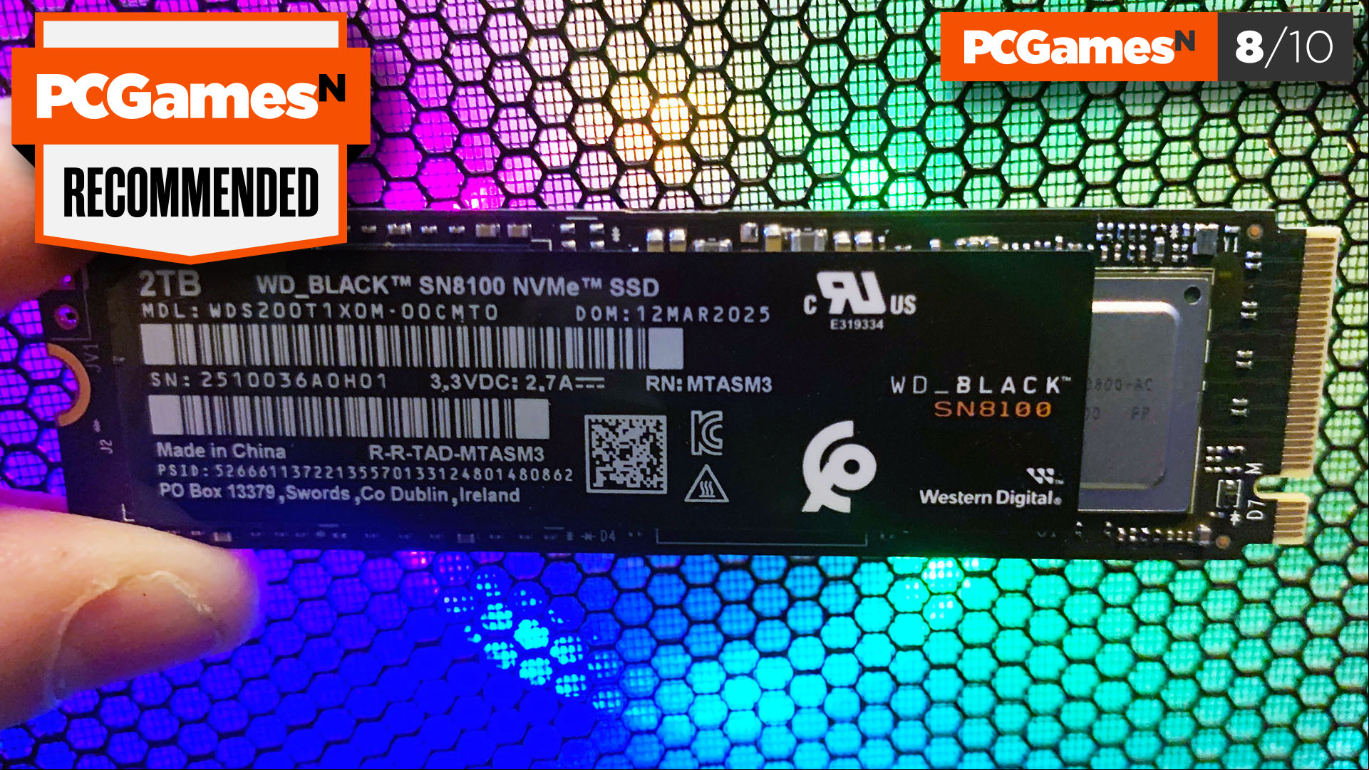 WD Black SN8100 review: Gaming SSD in front of RGB lighting.