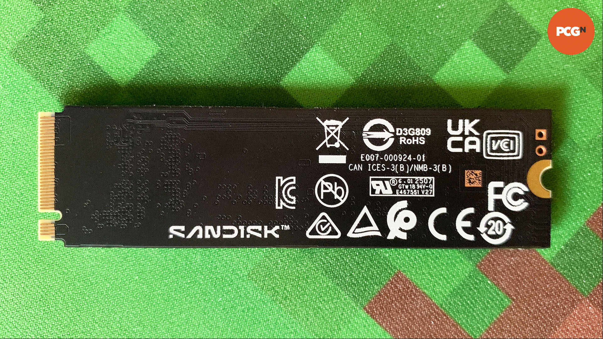 WD Black SN8100 review: gaming SSD underside on Minecraft mousemat.